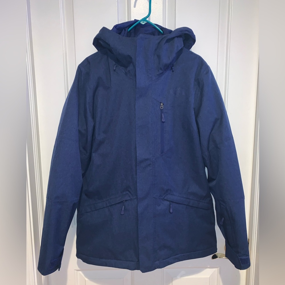 The North Face women’s size large, freedom blue triclimate ski jacket.